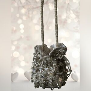 Silver sequined & beaded mini bag with beaded handle and drawstring closure